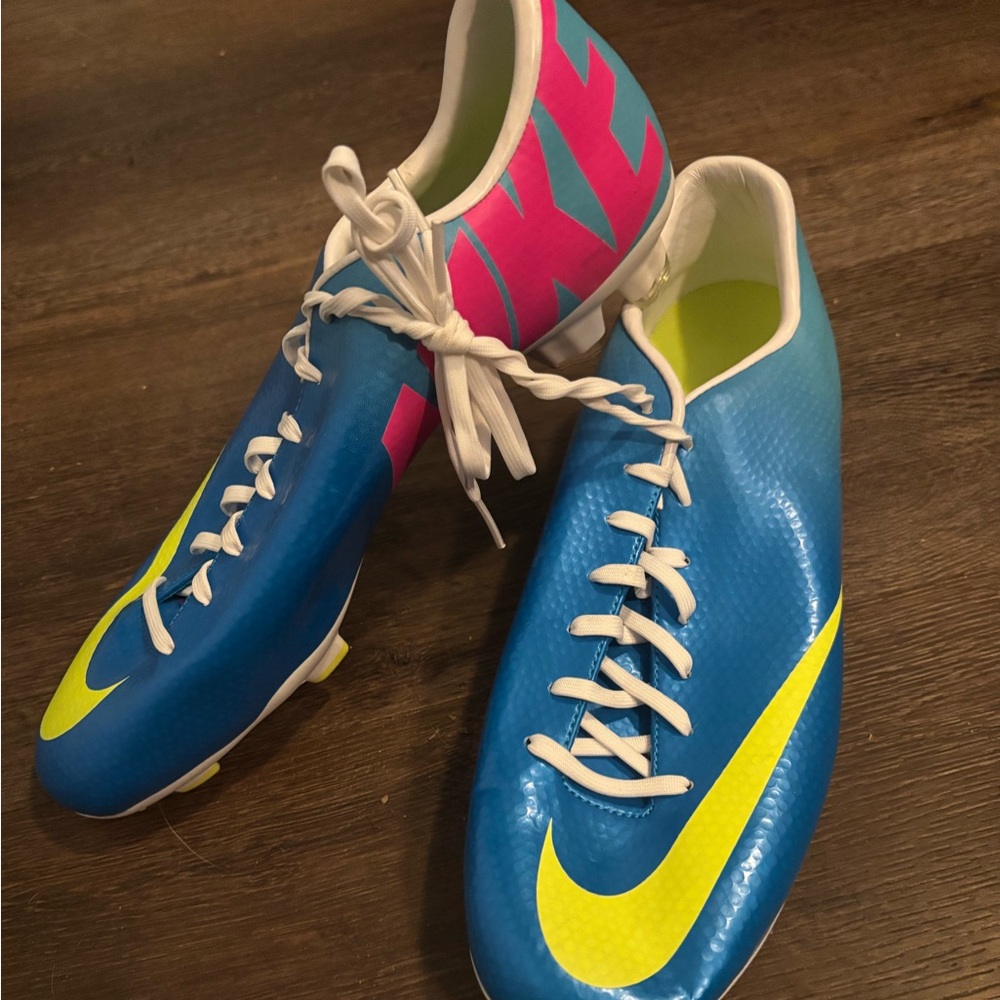 Nike Blue Soccer Cleats with Pink and Yellow Accents